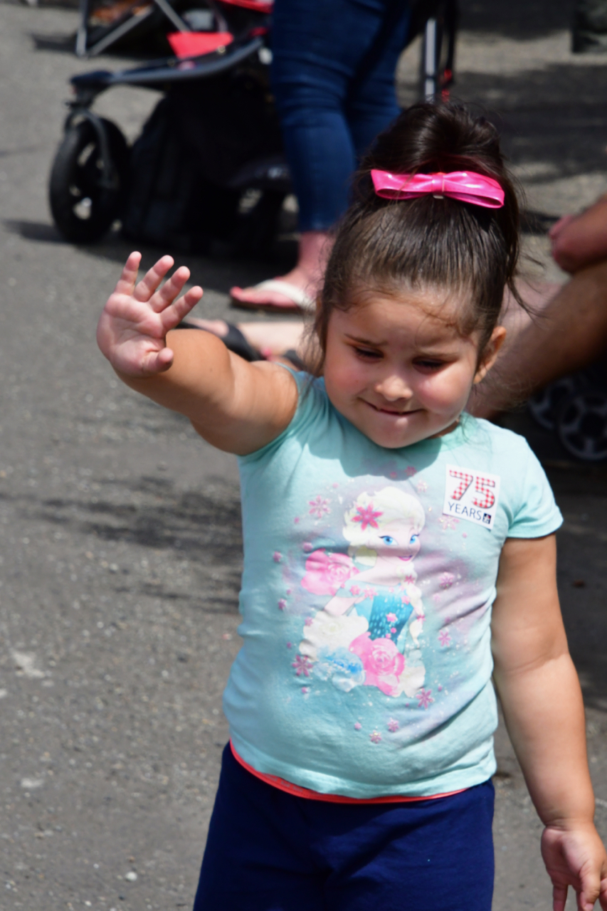 What do you do at parades? WAVE! Photo by Patrick Robinson