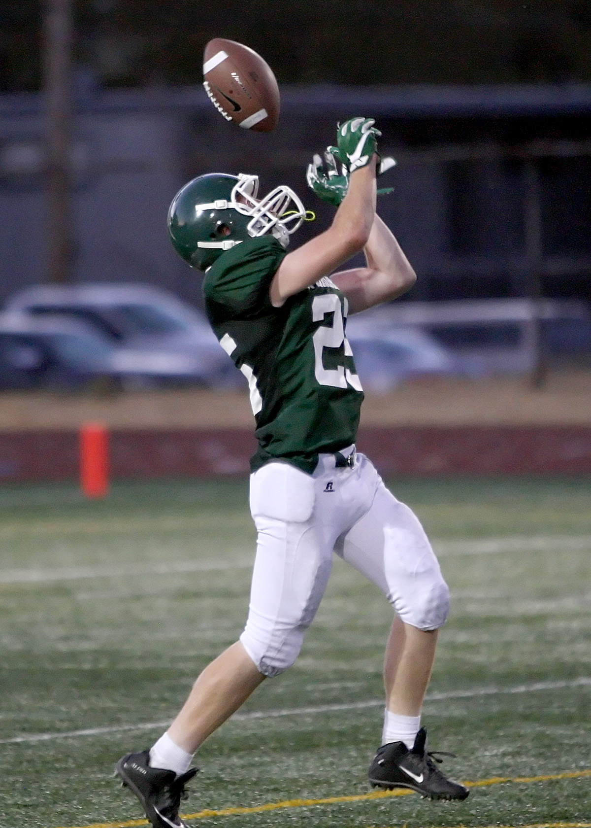 Darius Salisbury of Evergreen mishandles the ball on a kickoff.