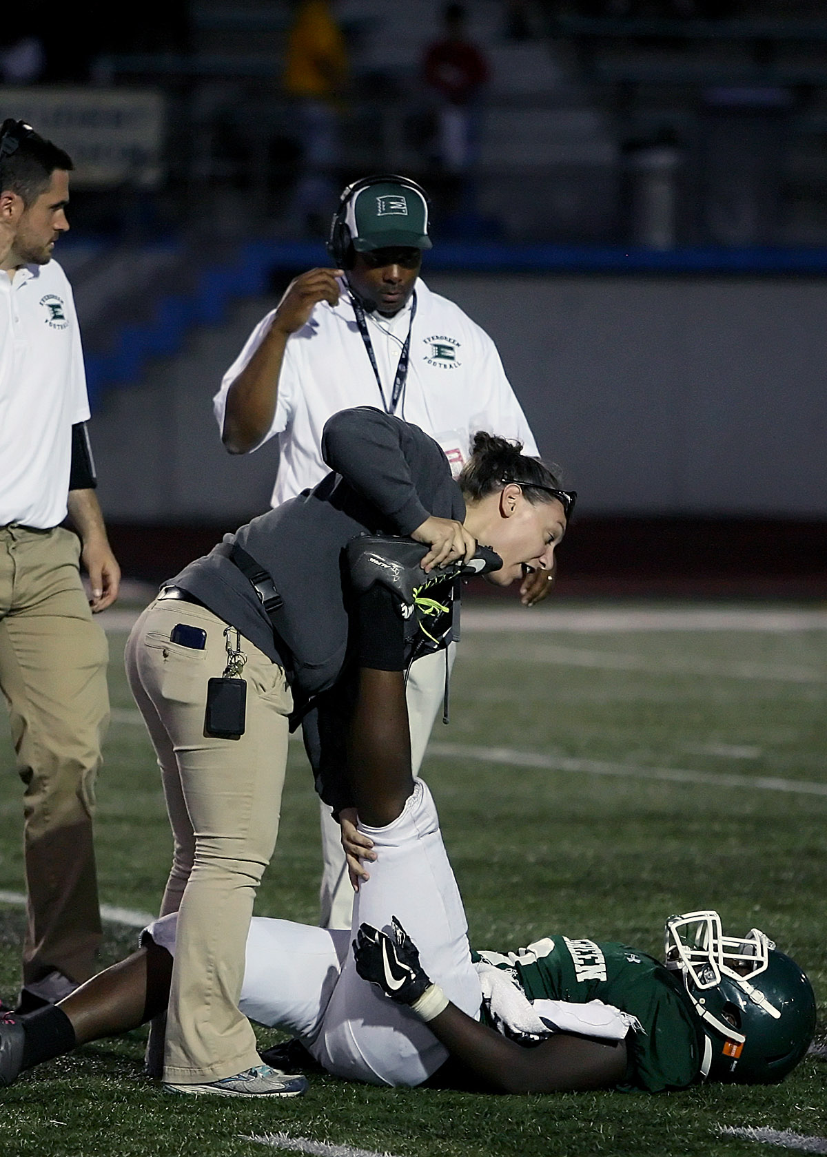 TyQuan Holms of Evergreen is attended to after an injury.