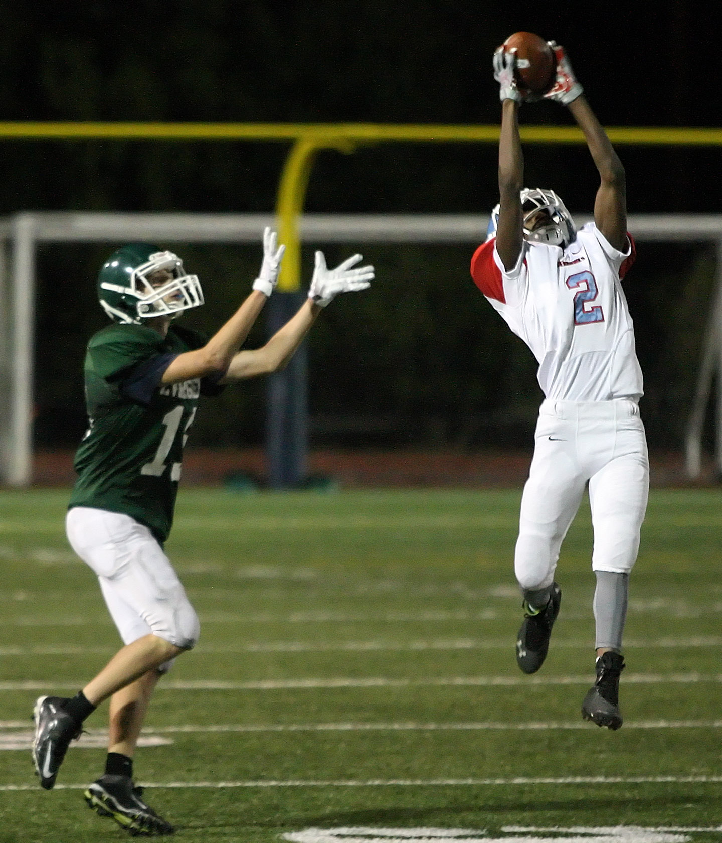 Tyon Manning of Chief Sealth intercepts the ball intended for Evergreens Michael Meslar and runs it in for a touchdown.