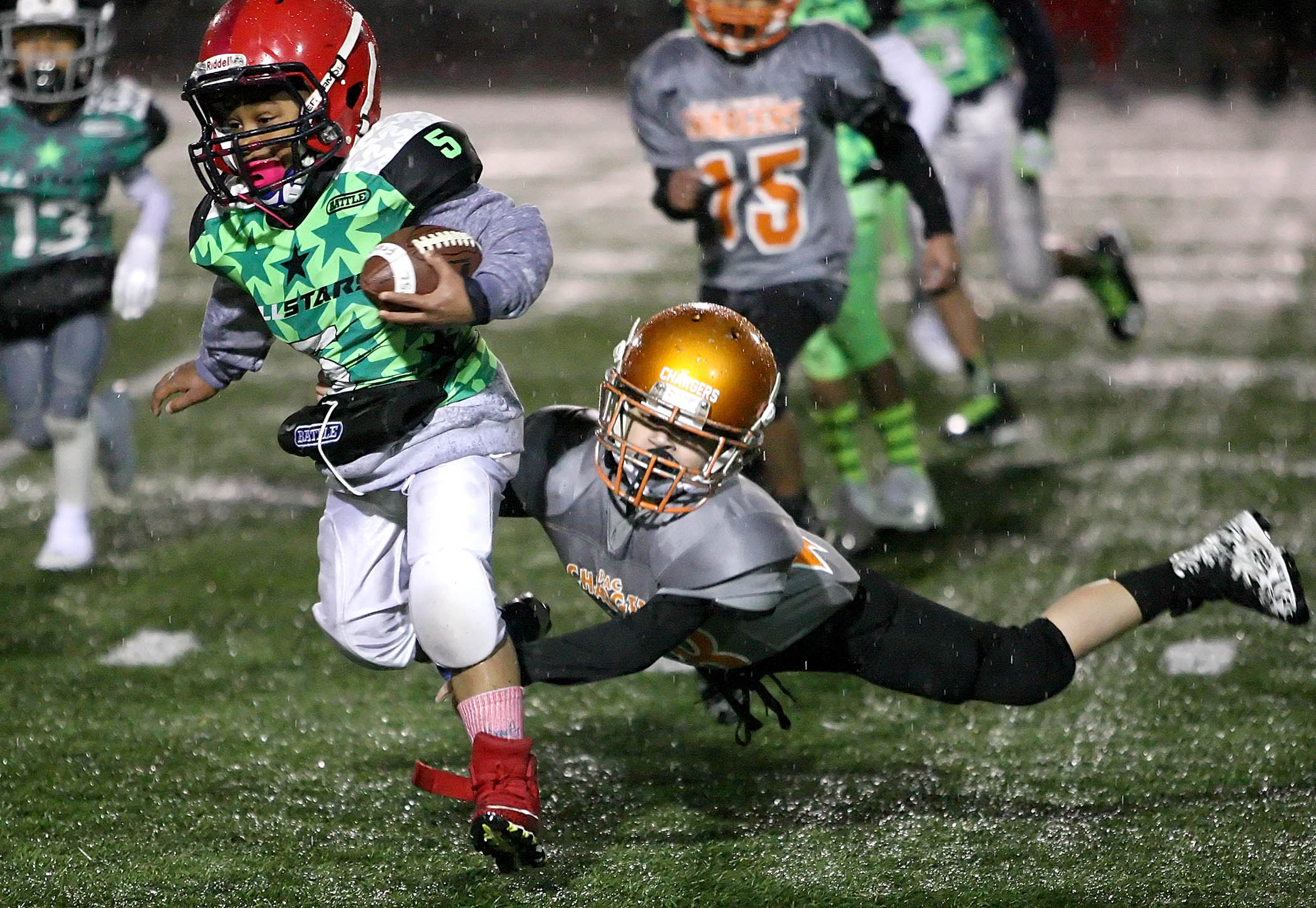 The 7 and under Championship game between the Puget Sound Lancers vs the Pac Hwy Chargers. Final score was Pac Hwy Chargers 19, Puget Sound Lancers 13. Photo by Kurt Howard