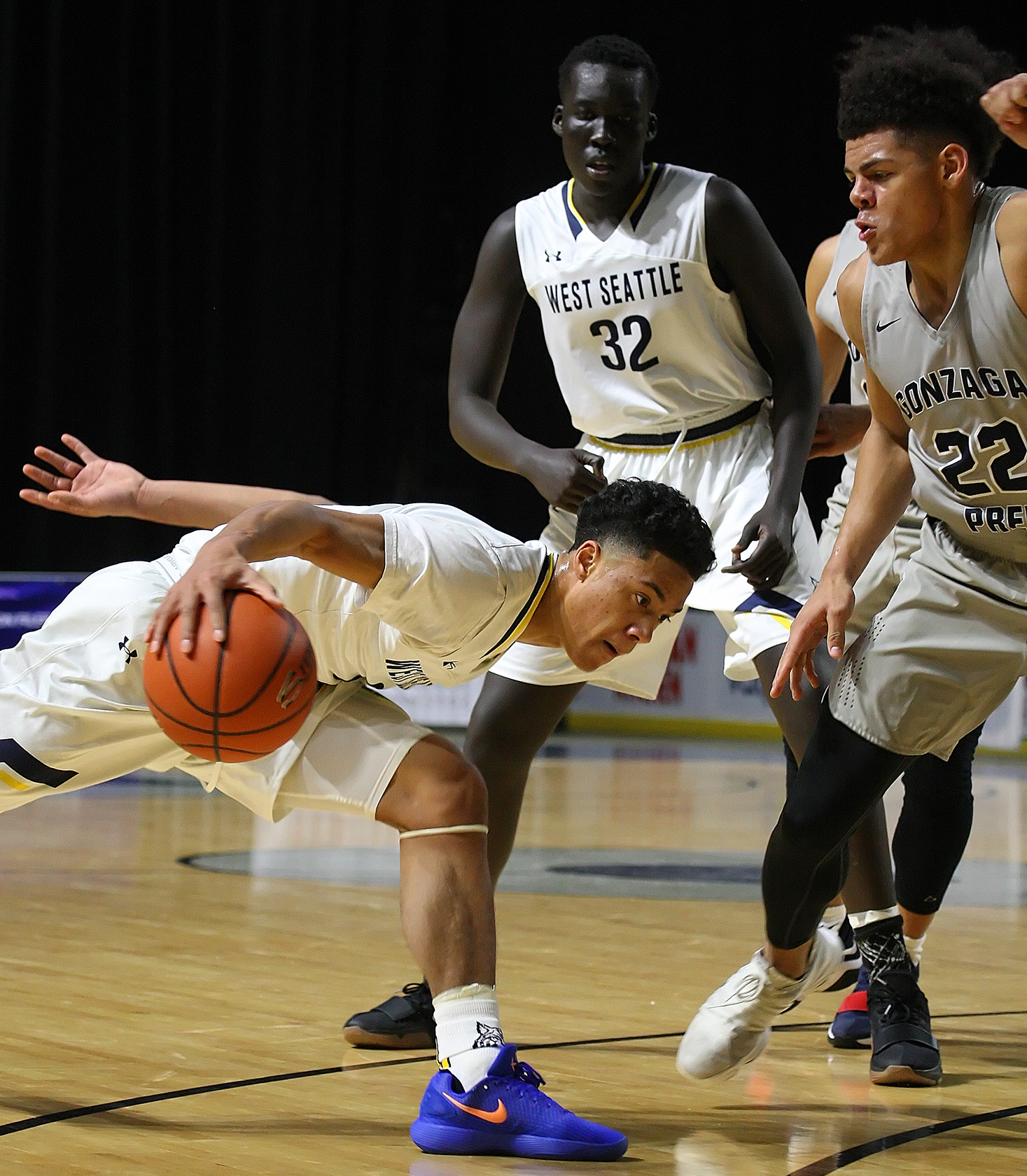 Elijah Nnuanbu of West Seattle puts on the brakes with his dribble.