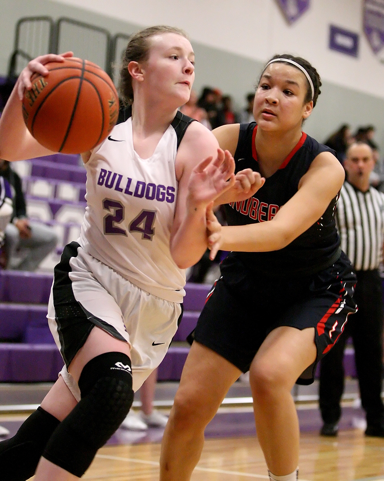 Julianna Dempsey of Foster drives baseline against Lindbergh's Alani Watts.