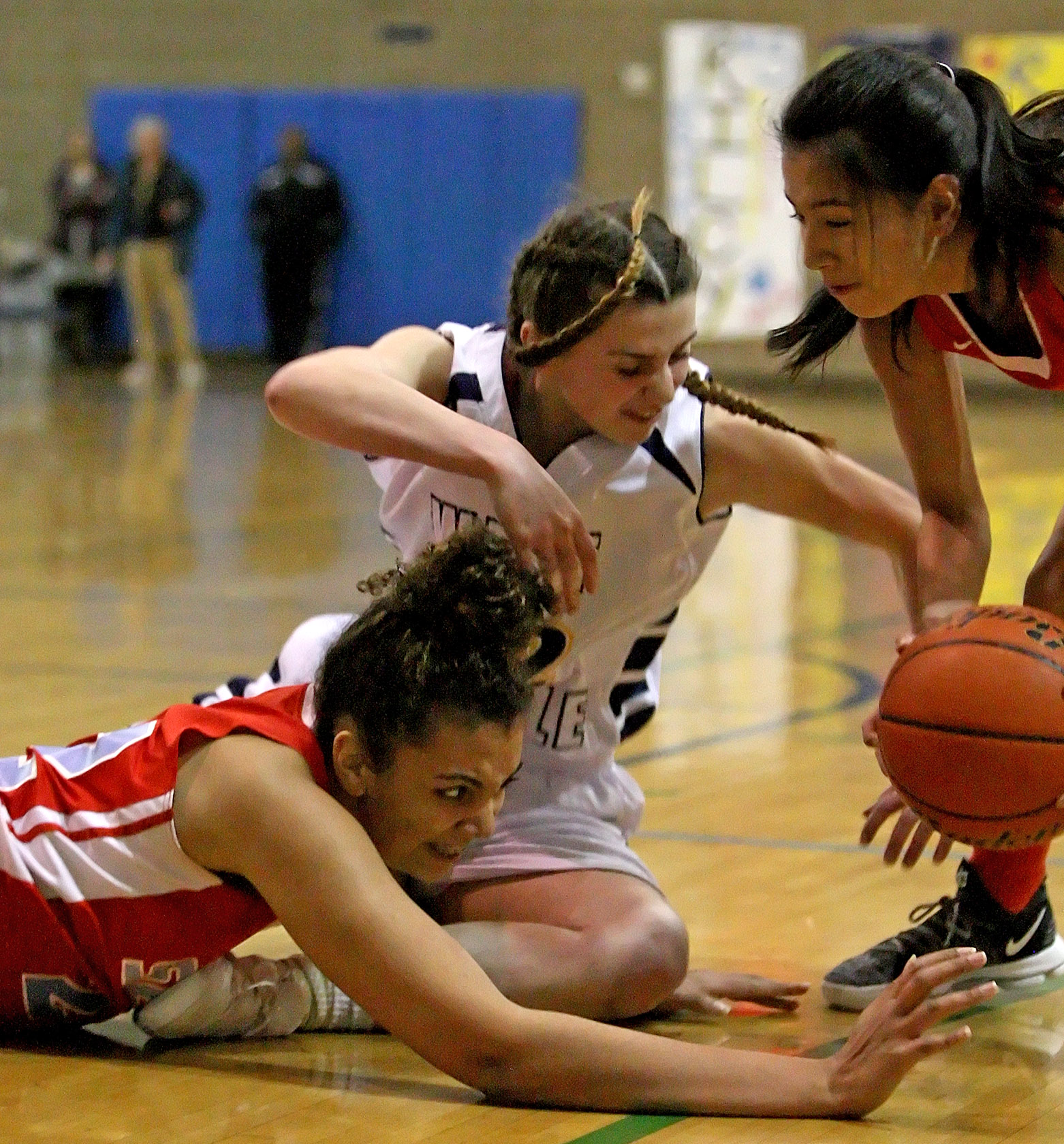 Celia LaGuardia and teammate Kamryn Thomas of Chief Sealth try got keep the ball away from West Seattle's Kat Anawalt