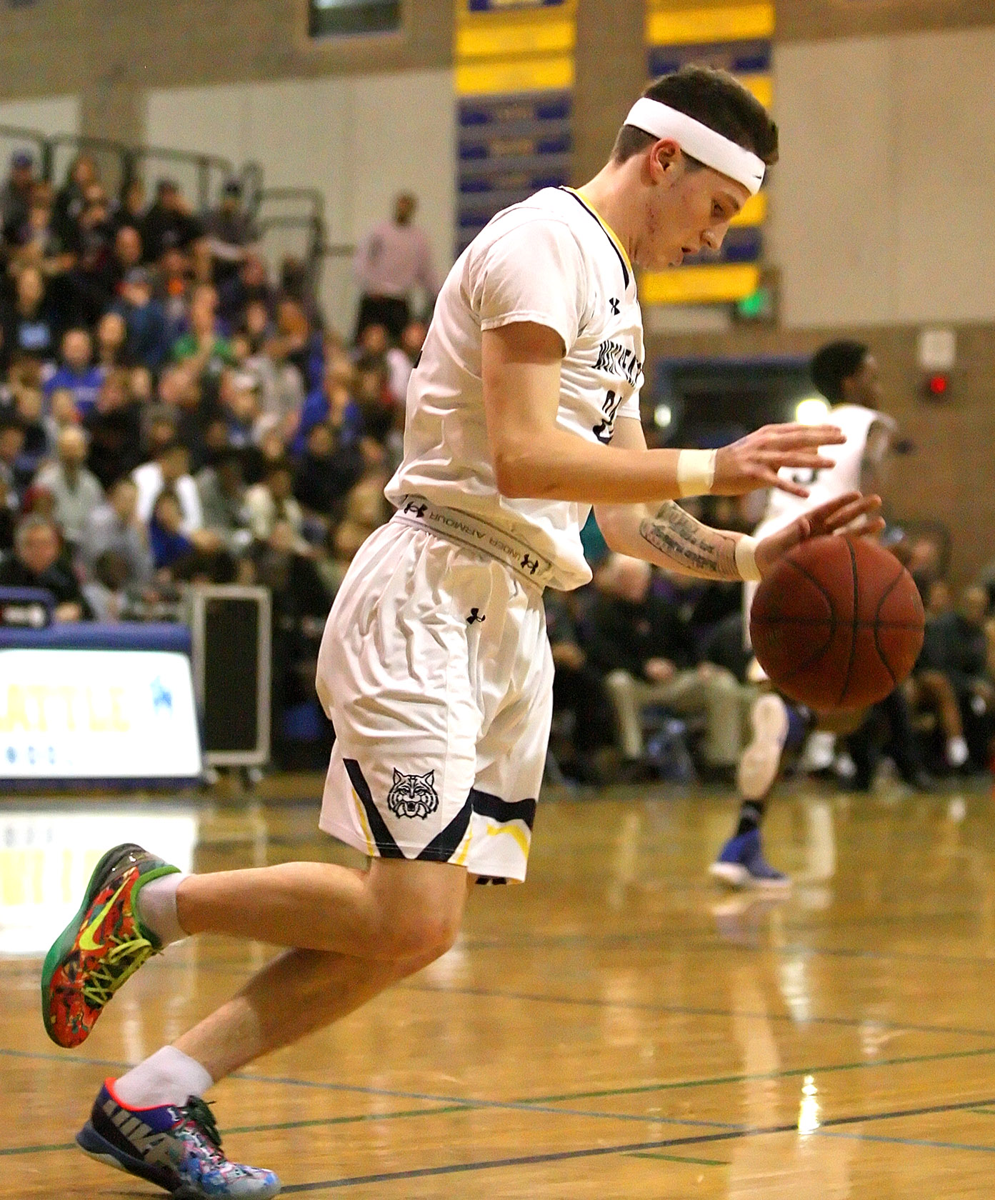 Simon Harris of West Seattle tries to gain control of the ball.