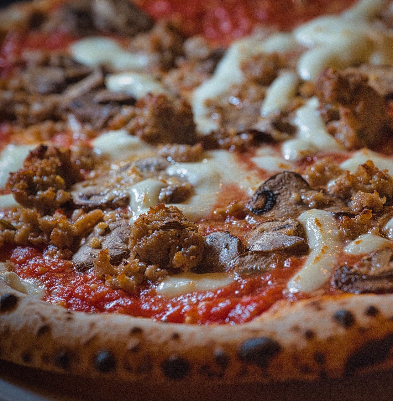 Cascioppo $23.00 Italian Tomato, Mozzarella, Sausage, Mushroom