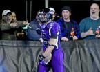 Timberwolves fans celebrate in the end zone after Andre Piper-Jordan scores a touchdown.