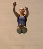 Ashley Knox of Kennedy Catholic performs the 1 meter reverse dive.