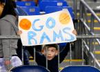 A young fan shows his support for the Mt. Rainier Rams.