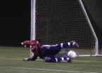 The ball barely gets by Foster's goalie Kamal Gulaliyev from a penalty kick by Evergreen's Kevin Ventura which tied the game at 1 each.