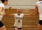 Sophie Miller celebrates with teammates after Beamer received a point against TJ.