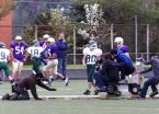Highline and Evergreen football players are filmed.