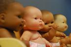Children have their own babies to play with.Photo by Patrick Robinson