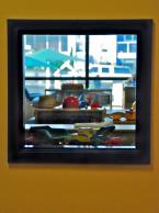 An architectural detail frames the outside world suggested by the world of toys. Photo by Patrick Robinson