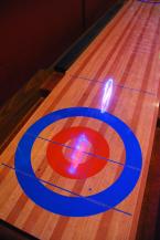 No pool tables but one shuffleboard is available. Photo by Patrick Robinson