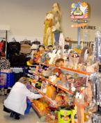 A shopper checks out Halloween merchandise at the new Des Moines Goodwill DM Goodwill 3.jpg