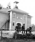 Students hang around the original portion Sunnydale Elementary School in Burien. History museum 3.jpg