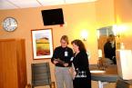 OnCology unit director Chris Laux, left, and Gina Dolleman, clinical manager for medical tele-oncology, confer in one of the family rooms in Highline's  new Patient Care Unit.  news01-B.jpg