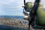 Over the city of Seattle in a B-17. Photo by Patrick Robinson B-17 over SpaceNeedle.jpg