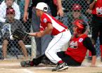 Anthony Coats of West Seattle slides safely home as the ball gets by the mitt of Rainier's pitcher. Photo by Kurt Howard IMG_9167 5x7 300dpi.jpg