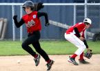 Matt Dietz of WS heads to second as the ball gets by Rainier's second baseman. Photo by Kurt Howard IMG_9501 5x7 300dpi.jpg