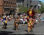 Mexican dancers march past Town Square and the Library/City Hall during Burien’s Independence Day Parade.