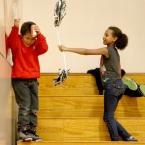 Girls can be so mean, attacking boys with girly pompom thingys.