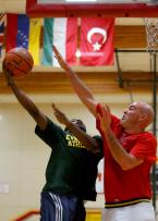 AJ Campanelli of Tyee gets an hand in the face of an Evergreen player.