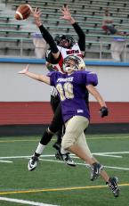 Beck Brennan of Ballard is called for defensive interference against Highline's receiver, Zachery Beckham.