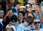 Some Mt Rainier fans in the stands pose for a group selfie before the game.