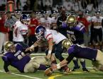 Sam Houghtby of Highline dives on the ball to recover a Kennedy's fumble.