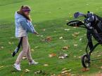 Pirates' golfer, Jacqueline Kemp, making contact on the golf ball, in the rough, at the Seamount League Golf Tournament on the Auburn Golf Course Saturday.