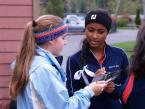 Lancers' Makenzie Milton and Pirates Jacqueline Kemp going over their golf scores with each other after action at the Seamount League Golf Tournament.