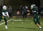 Quarterback Ryan Thol of Evergreen laterals the ball to running back Theo Mowatt.