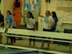 Rams' Zoe Kalaw and Delaney Fulton cheering on teammates in the 4A West  Central District meet at the Curtis pool Saturday