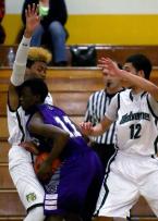 Ali Ahmed of Foster does a head plant into the armpit of Evergreen's Joseph Thatch.