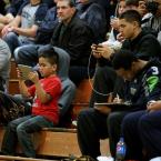 OK guys, put the electronics down, there's a basketball game going on!