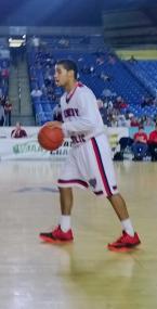 Keannu Royster brings the ball up for Kennedy Catholic.