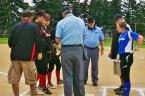 Coaches, captains and umpires meet before the Chimacum game.
