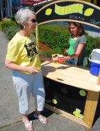 Janet Michael a parishioner from Holy Rosary brought in 2300 diapers and $400 cash.Photo by Patrick Robinson