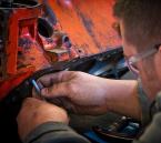Cameron Saylor is seen working on a cylinder Boar to see if the pistons ride correctly. Photo by David Rosen
