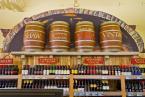 Faux wine casks sit above the wine display. Photo by David Rosen