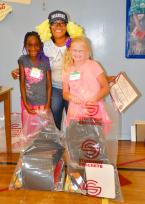 Roxhill Principal Sahnica Washington with students. Photo by Geoff Miller of Roxhill Elementary