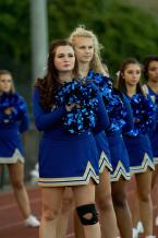 West Seattle Cheerleaders stand for the national anthem before a game vs. the Washington Patriots. Photo by Paul Moseley