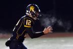 West Seattle Quarterback Carter Golgart prepares to take a snap in a game against Highline. Photo by Paul Moseley