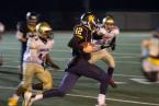 West Seattle Quarterback Carter Golgart rushes in a game against Highline. Photo by Paul Moseley