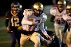 Highline Quarterback Kyle Tief rushes against West Seattle. Photo by Paul Moseley