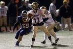 Highline receiver AJ Sailiai looks back as he rushes for a touchdown against West Seattle. Photo by Paul Moseley