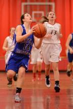 Taylor Stordahl (10) goes in for a lay-up during the second half. Photo by Anastasia Stepankowsky.