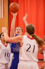 Emma Figgins (22) tries for a three-pointer in the second half. Photo by Anastasia Stepankowsky.